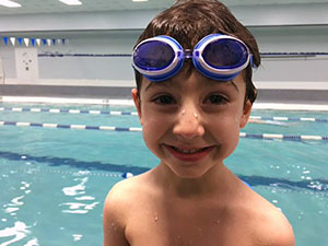 Kids smiling at swim lessons